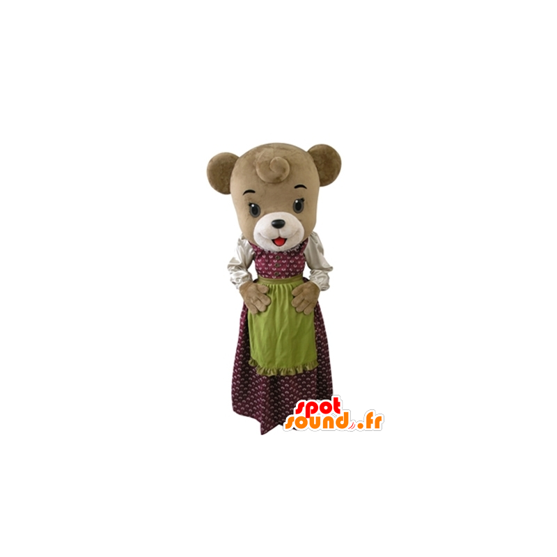 Brun björnmaskot klädd i en klänning med ett förkläde -