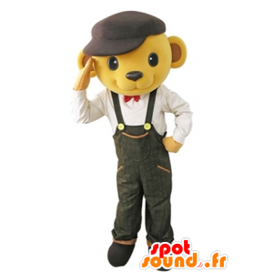 Mascot urso amarelo vestido de macacão com uma boina - MASFR031619 - mascote do urso