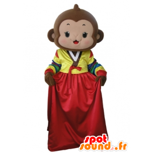 Brun abe maskot med en farverig kjole - Spotsound maskot kostume