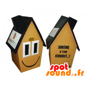 Gule huset maskot, brunt og svart, veldig smilende - MASFR031778 - Maskoter Hus