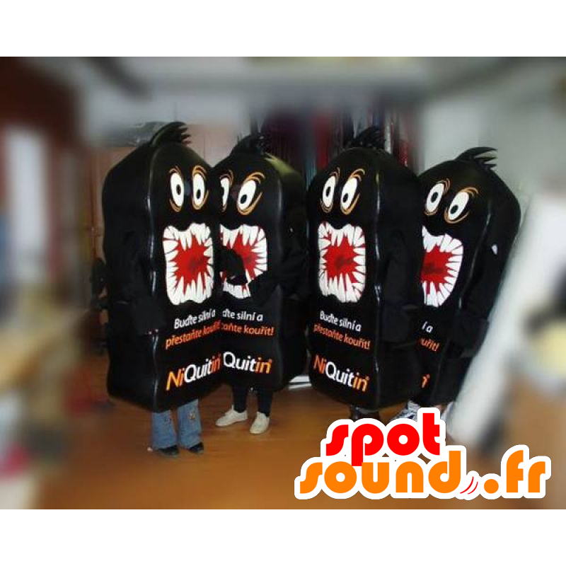 4 Niquitin Maskottchen. 4 mascots schwarze Monster - MASFR031807 - Monster-Maskottchen