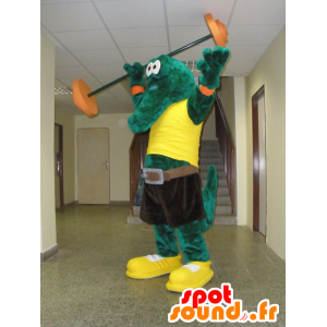 Grøn krokodille maskot med en gul t-shirt - Spotsound maskot