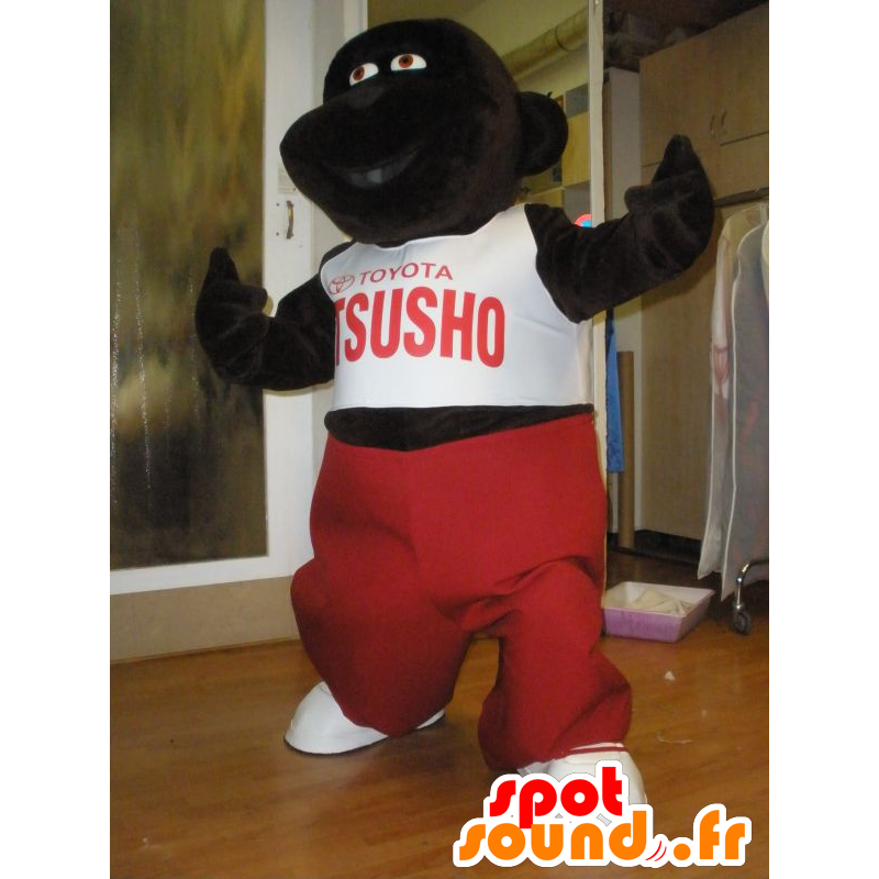 Dark brown gorilla mascot with a red and white outfit - MASFR031966 - Gorilla mascots