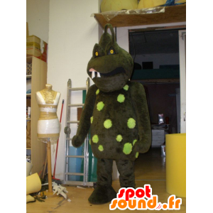 Brun og grøn monster maskot, skræmmende - Spotsound maskot