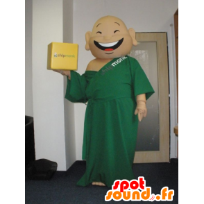 Mascot griner munk, klædt i en grøn tunika - Spotsound maskot