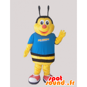 Mascot yellow and black bee, dressed in blue - MASFR032051 - Mascots bee