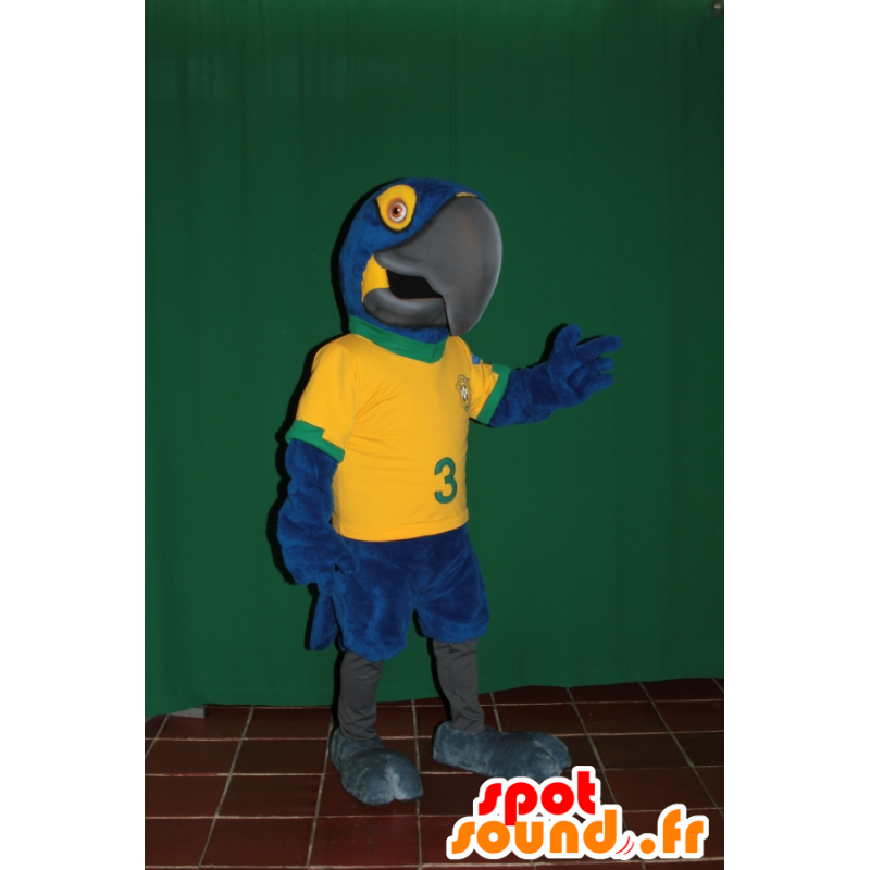 Blå og gul papegøje maskot med en brasiliansk trøje - Spotsound