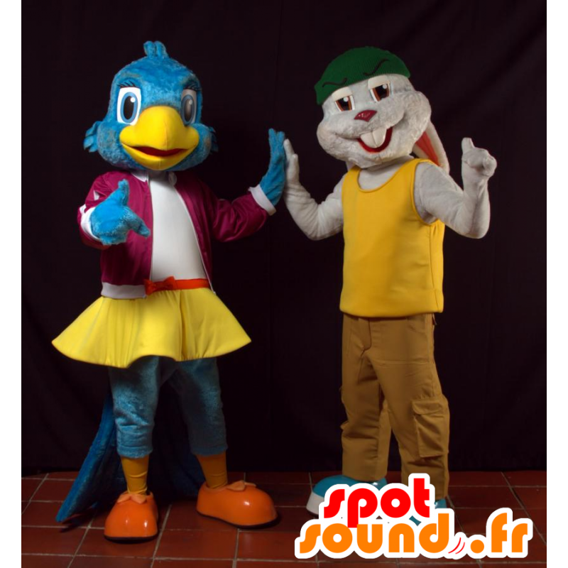 2 mascots, a blue bird and a gray rabbit - MASFR032069 - Mascot of birds