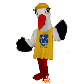 Mascotte de cigogne noire et blanche avec un dossard jaune - MASFR032108 - Mascottes de l'océan