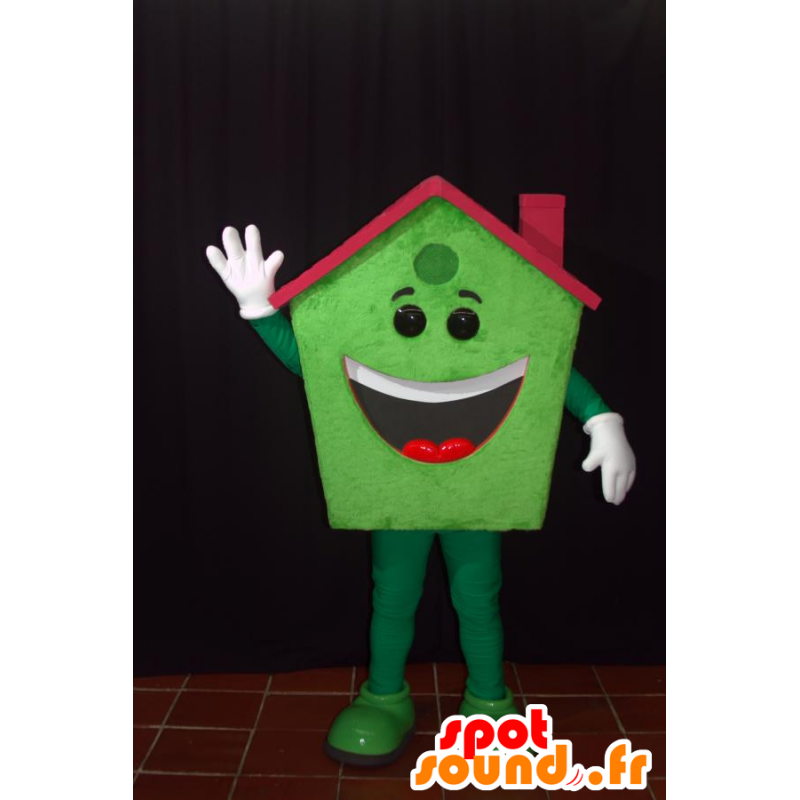 Mascotte groen thuis, glimlachen, met een rood dak - MASFR032146 - mascottes Huis