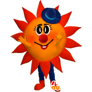 Mascotte de soleil rouge et jaune avec un chapeau bleu - MASFR032358 - Mascottes non-classées