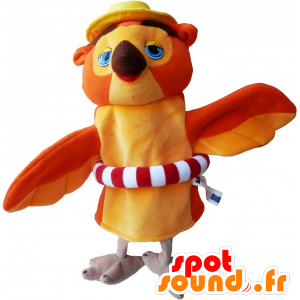 Orange och beige uggelmaskot med en boj - Spotsound maskot