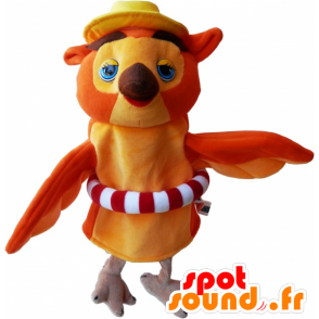 Orange og beige uglemaskot med en bøje - Spotsound maskot