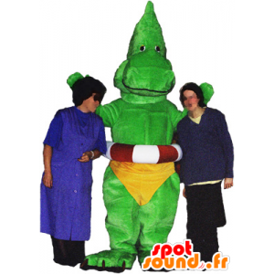 Dragon maskot, grön dinosaurie med gula underbyxor - Spotsound