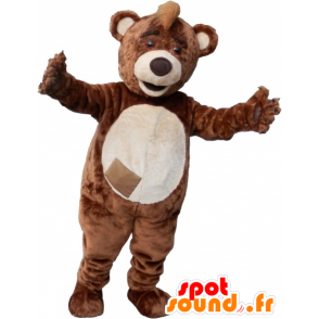 Brown and beige teddy mascot with a crest on the head - MASFR032492 - Bear mascot