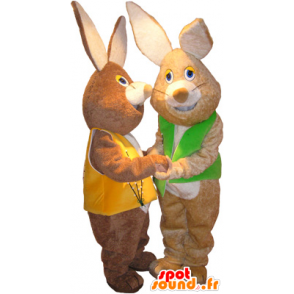 2 mascots braune und weiße Kaninchen mit farbigen Westen - MASFR032496 - Hase Maskottchen