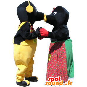2 maskotar: par svarta och gula mullvadar - Spotsound maskot