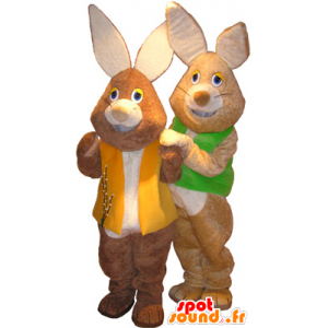 2 mascots brown and white rabbits with colored vests - MASFR032517 - Rabbit mascot