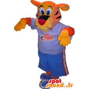 Tigo mascota del tigre, naranja y amarillo vestido de deportes azul - MASFR032522 - Mascota de deportes