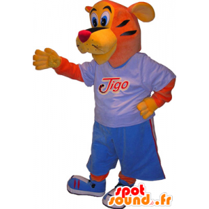 Tiger Mascot Tigo, laranja e amarelo vestido em esportes azuis - MASFR032522 - mascote esportes