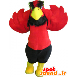 Mascotte d'aigle rouge et jaune avec un short noir - MASFR032584 - Mascotte d'oiseaux