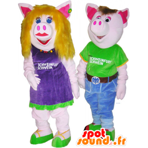 2 mascottes varken man en vrouw in kleurrijke outfits - MASFR032682 - Vrouw Mascottes