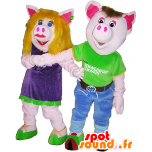 2 Maskottchen Schwein Mann und Frau in bunten Outfits - MASFR032682 - Maskottchen-Frau