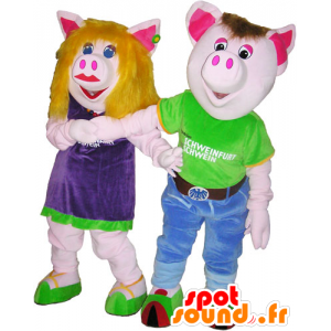 2 mascottes varken man en vrouw in kleurrijke outfits - MASFR032682 - Vrouw Mascottes