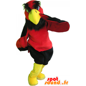 Mascotte avvoltoio rosso e giallo con pantaloncini neri - MASFR032698 - Mascotte degli uccelli