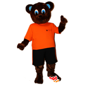 Brun bjørnemaskot i orange og sort tøj - Spotsound maskot