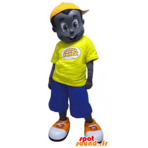Sort dreng maskot klædt i gul og blå - Spotsound maskot