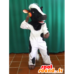Mustavalkoinen lehmän maskotti kuulokkeilla - MASFR033070 - lehmä Maskotteja