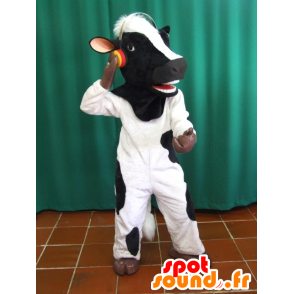 Mascote vaca preto e branco com fones de ouvido - MASFR033070 - Mascotes vaca