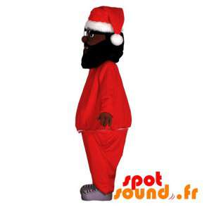 Maskot garvet mand klæder sig som julemanden. Afrikansk maskot