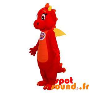 Söt och rörande röd och gul drakmaskot - Spotsound maskot