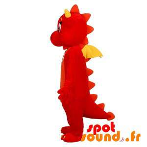Söt och rörande röd och gul drakmaskot - Spotsound maskot