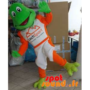 白とオレンジ色の服を着て緑のカエルのマスコット