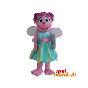 Rosa fe maskot, leende med en färgglad klänning - Spotsound