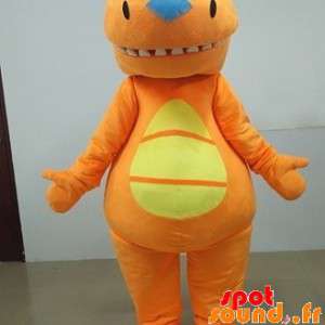 オレンジと黄色の恐竜のマスコット。オレンジ色のスーツ