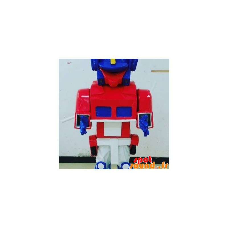 Blå, hvid og rød legetøjsmaskot Transformers måde - Spotsound