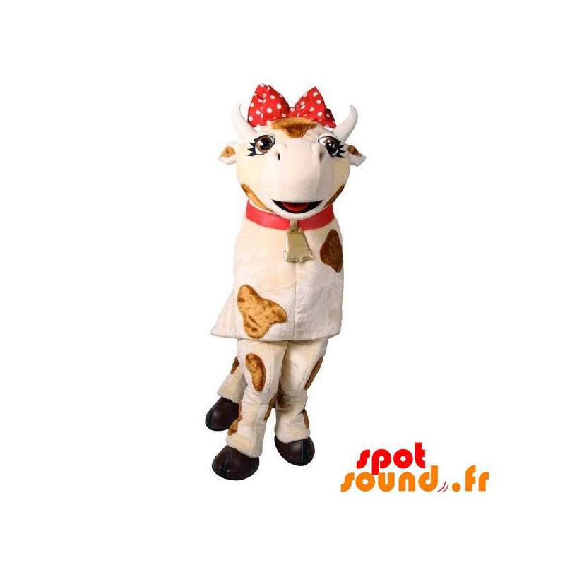 Vit och brun ko för maskot med en röd rosett - Spotsound maskot