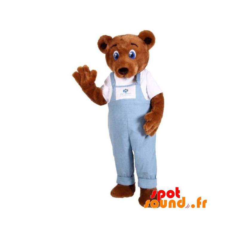 Brun nallebjörnmaskot som bär denimoveraller - Spotsound maskot