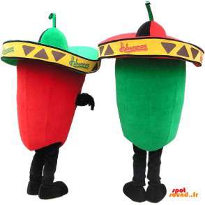 2 maskotar, en grön paprika och en röd paprika med hattar -