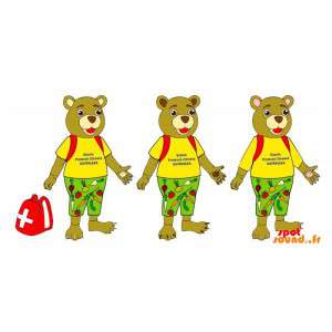 3 beige björnmaskoter klädda i färgglad outfit - Spotsound