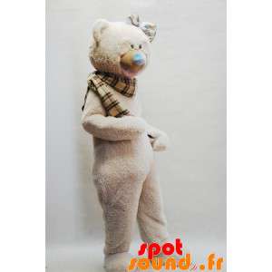 Beige bamse maskot med et plaid tørklæde - Spotsound maskot