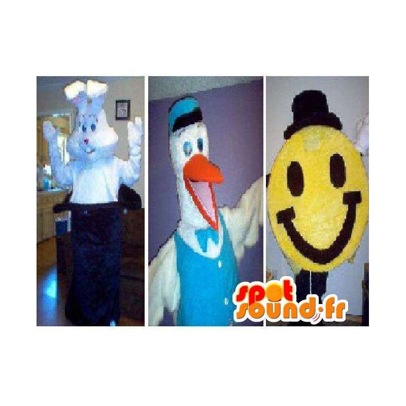 Trio av maskotar som består av en kanin, en stork och en smiley