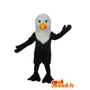 Kostume, der repræsenterer en sort due med et hvidt hoved -